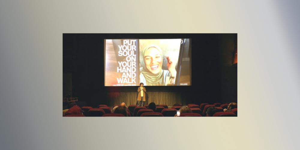 Review- “Put Your Soul on Your Hand and Walk” The Light of a Smile Amid the Darkness